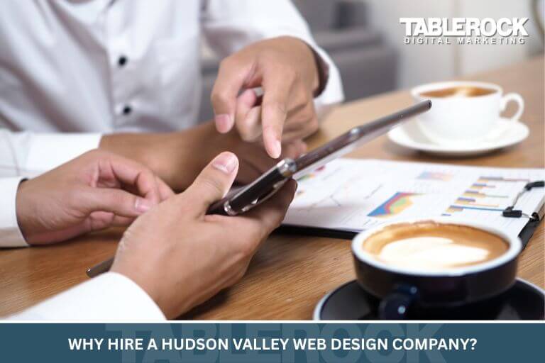 A client interviewing a Hudson Valley Web Design Company at a local coffee shop