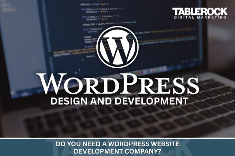 An open laptop with website code and the title: Do You Need a WordPress Website Development Company?
